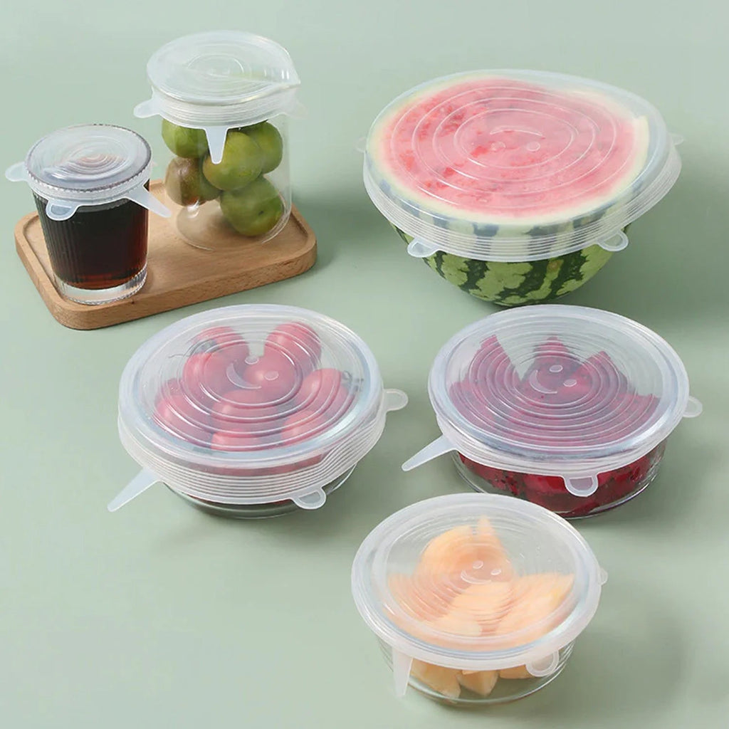 Set of 6 clear silicone stretch lids neatly stacked, showcasing their flexible design.