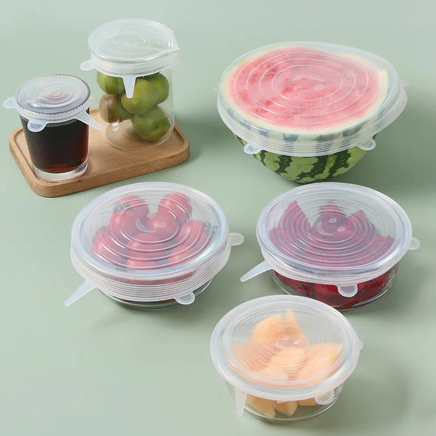 Set of 6 clear silicone stretch lids neatly stacked, showcasing their flexible design.
