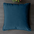 Soft decorative pillow covers in a living room setting.
