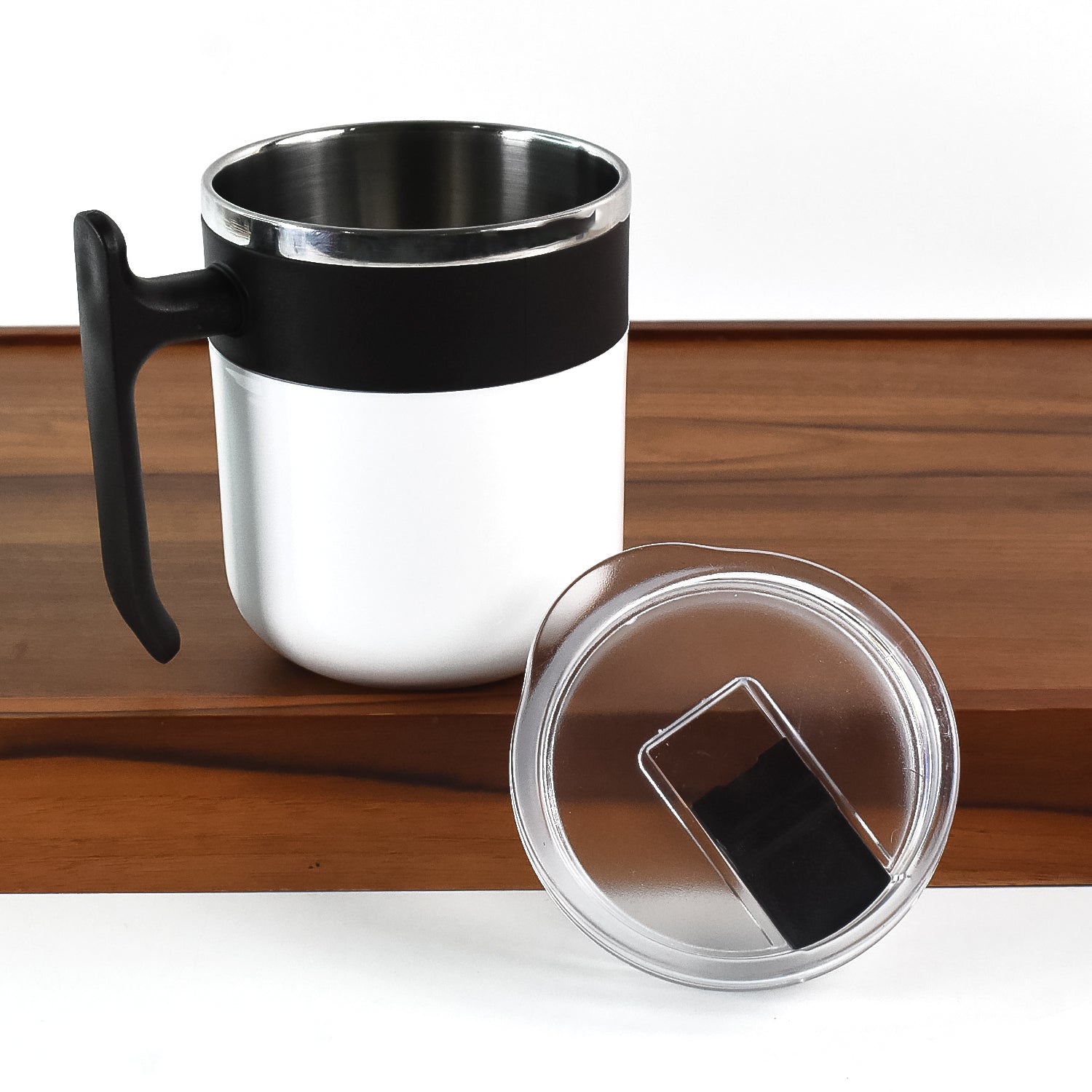 Insulated mug with white exterior and stainless steel inner, perfect for daily use.