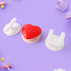 Waterproof reusable plastic hooks sticking firmly on smooth surfaces