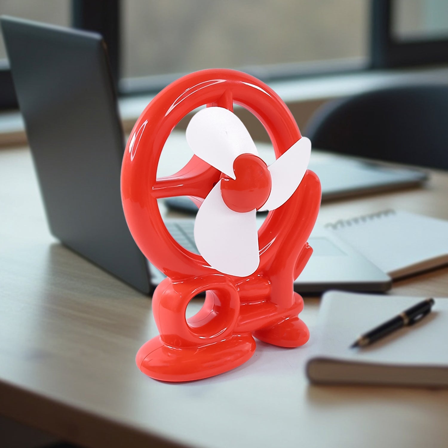 Top-down view of the sleek red Mini Cooling USB Fan design for small spaces.