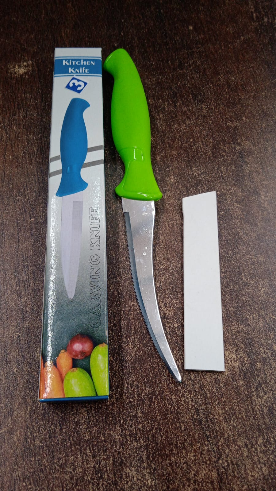 Kitchen knife with vibrant ergonomic handle perfect for daily use.