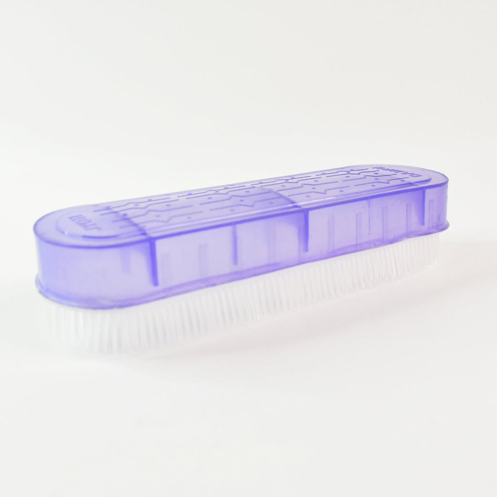 Compact multipurpose laundry brush fitting easily in storage