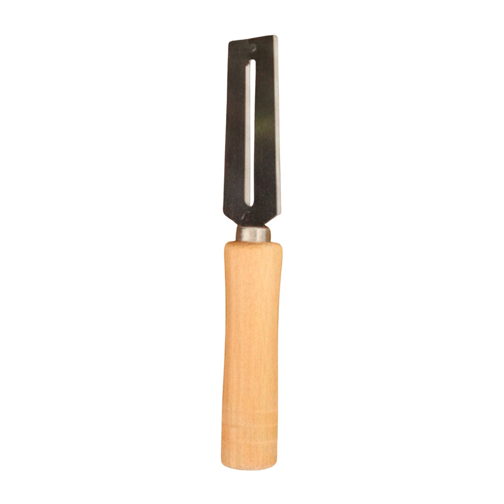 Close-up of sharp blade on stainless steel multipurpose vegetable peeler