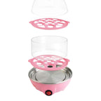 Close-up of the transparent lid and removable egg tray of the 2-layer egg cooker.
