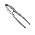 Stainless steel nut cracker with various nuts, including walnuts and almonds.