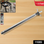 Hand holding stainless steel gas stove lighter for safe ignition