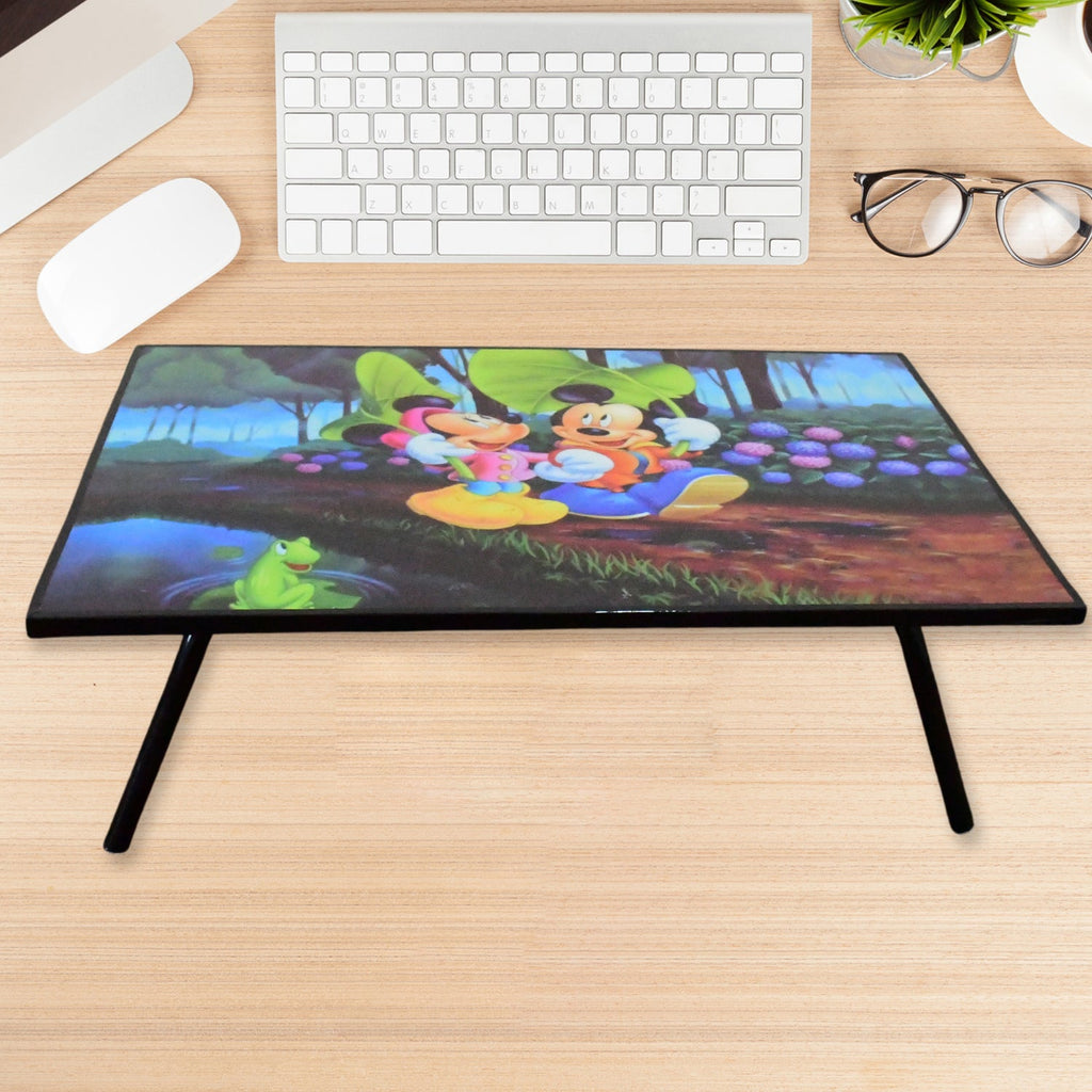 The underside of the foldable table, showing its robust leg mechanism.