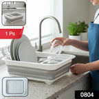 Foldable plastic dish drying rack with compartments for dishes and utensils