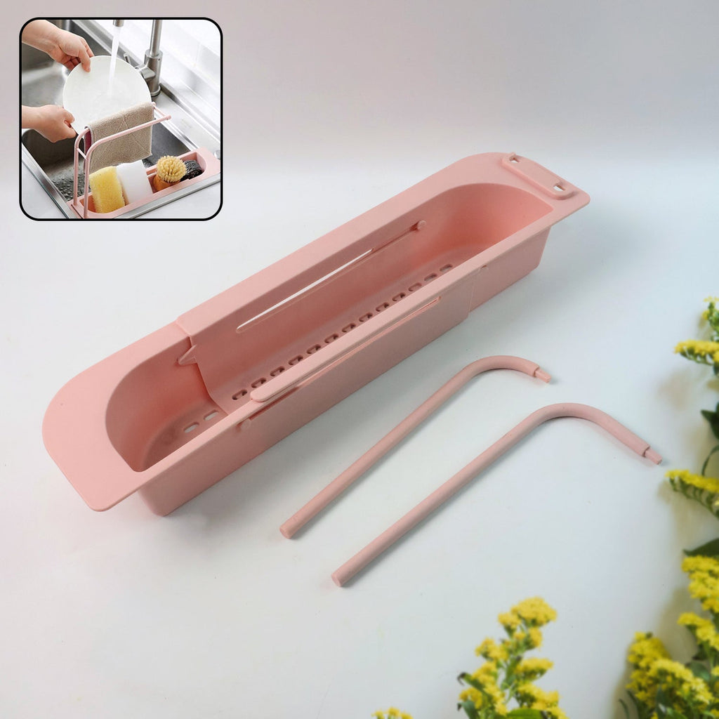 Adjustable plastic over-sink caddy with vented base allowing water drainage