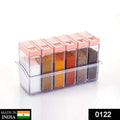 Airtight plastic spice jars in vibrant multicolor, neatly arranged.