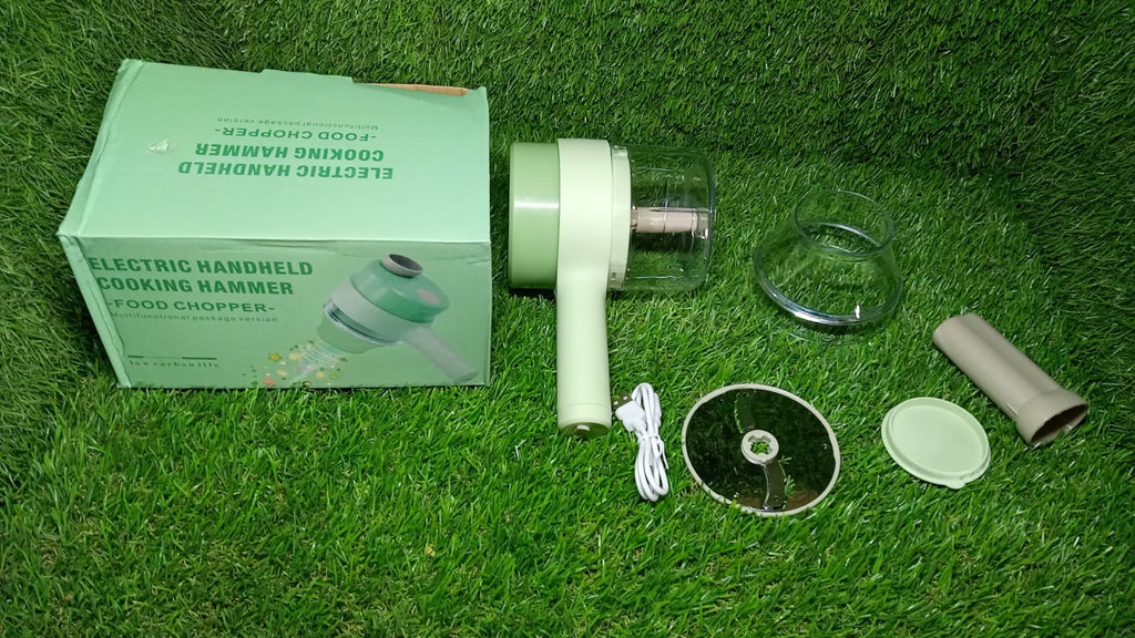 Side view of the electric vegetable cutter, compact and modern design.