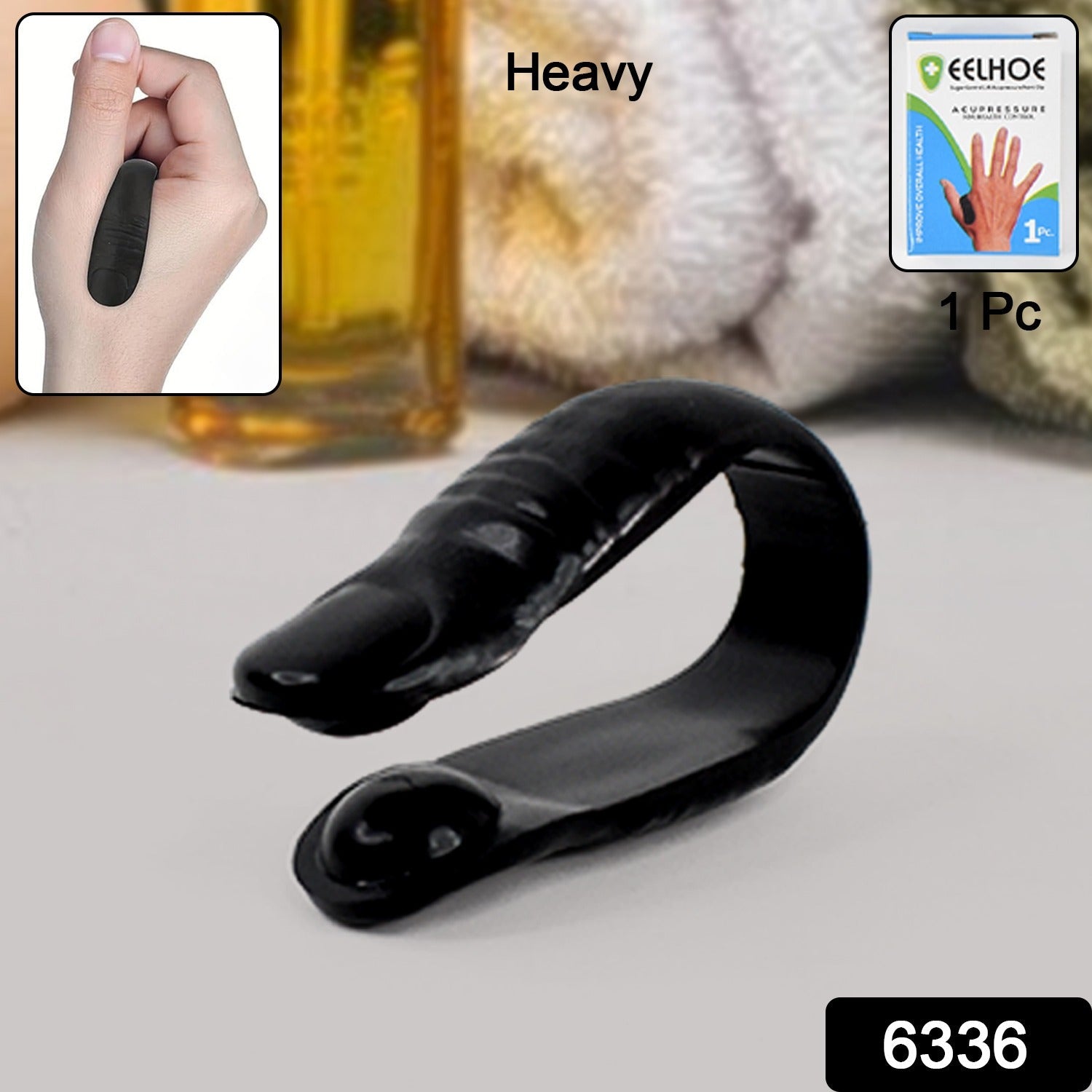 Close-up of LI4 Acupressure Point Clip applying gentle pressure