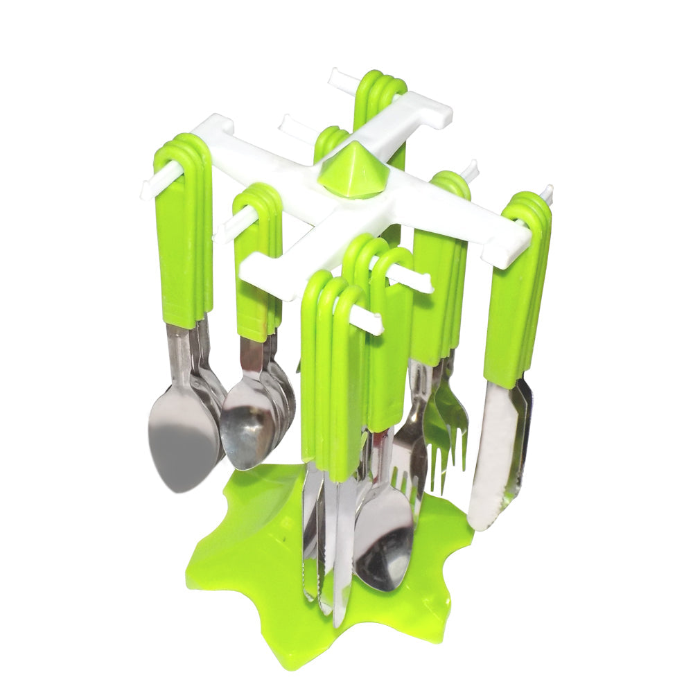 Complete 24-piece stainless steel cutlery set with a revolving stand on a dining table.