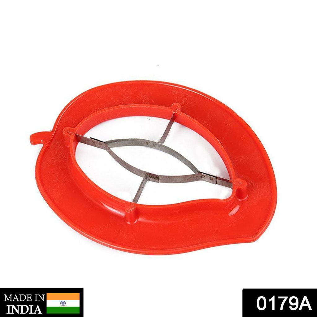 Mango cutter positioned over a ripe mango, ready to effortlessly remove the pit and slice.