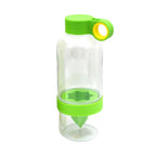 Angled view of an empty fruit infuser water bottle, highlighting its design.