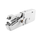 The  mini electric sewing machine held in hand, illustrating its portable scale.
