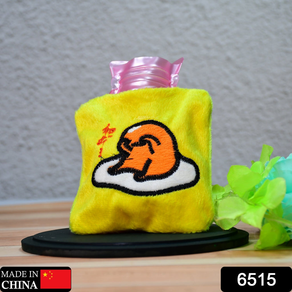 Close-up of the yellow duck head hot water bag, showcasing its adorable design.
