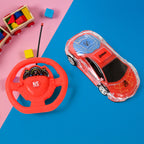 The kids racing toy alongside its USB charging cable and easy-grip remote.