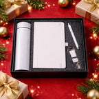 Premium 4-in-1 corporate gift set including bottle, notebook, pen, and keychain