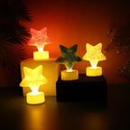 Close-up of Star LED Tealight Candles glowing with a warm light, perfect for festive decor.