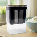 Yogurt strainer with transparent base for easy monitoring of strained yogurt