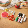 Compact sewing kit with needles, threads, scissors and measuring tools