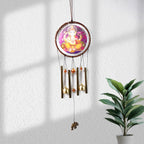 Lord Ganesh Wind Chimes hanging outdoors with vibrant traditional colors
