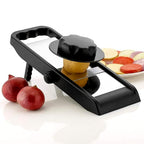 Hand slicing a potato into perfect, even chips using the adjustable slicer.