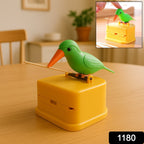 Close-up view of bird toothpick dispenser showing press-type toothpick release