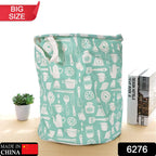 Foldable laundry bag in a vibrant print, ideal for storing clothes and children's toys.