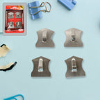 Heavy-duty self-adhesive hooks securely holding a robe, coat, and towel in a modern bathroom.
