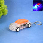 Mini Car LED Keychain Light with bright flashing headlights in vibrant colors