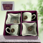 Elegant ceramic tea cup set with matching snack bowls, ideal for serving beverages and treats.