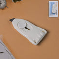 Mini Cloud Box Cutter showing sharp stainless steel blade