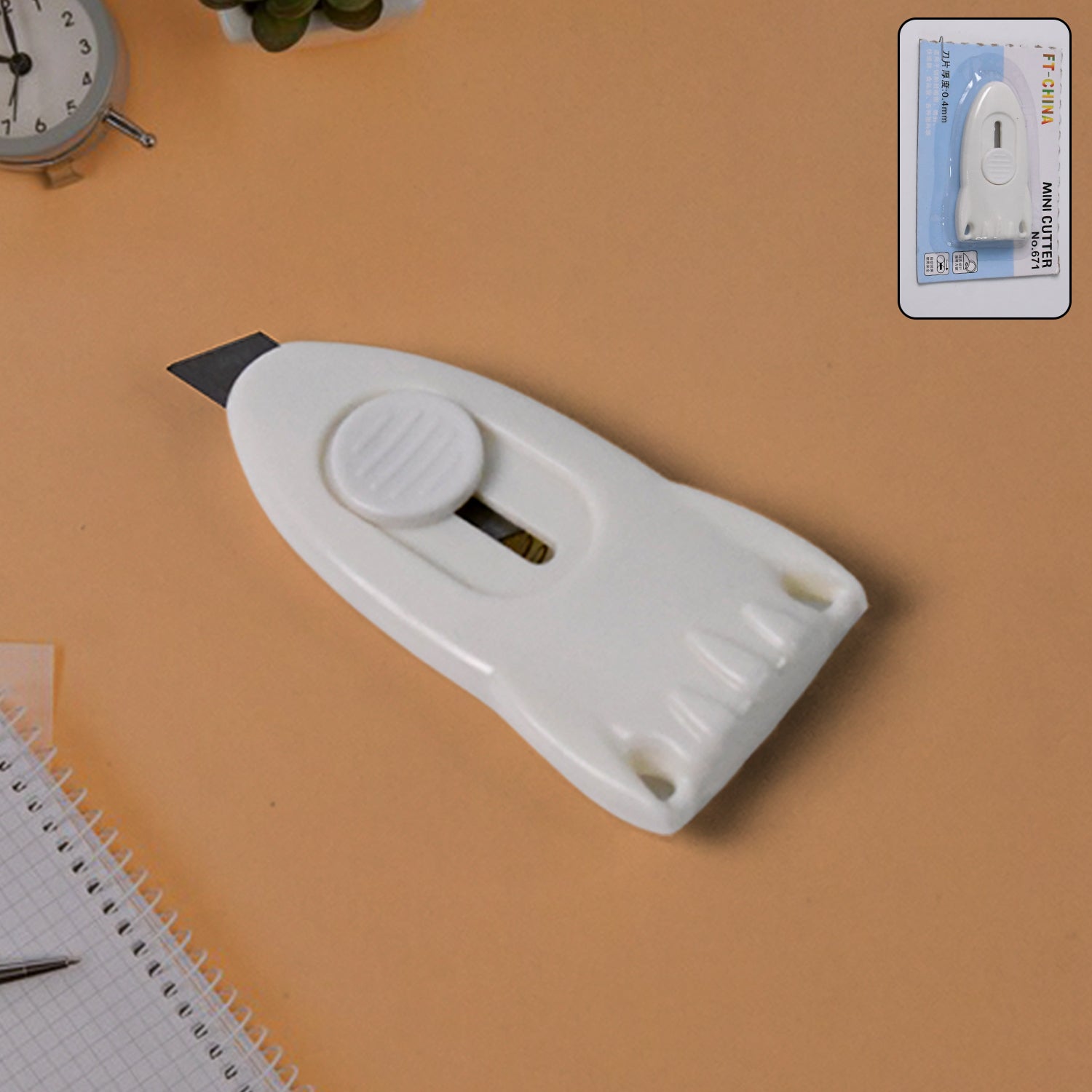 Mini Cloud Box Cutter showing sharp stainless steel blade