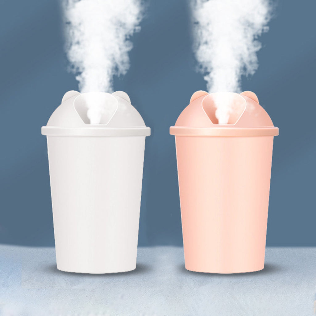 USB humidifier emitting a soothing mist with a vibrant multicolor light display.