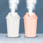 USB humidifier emitting a soothing mist with a vibrant multicolor light display.