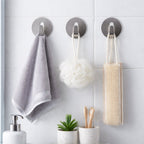 Sleek stainless steel hook securely mounted on a wall, ready for use.