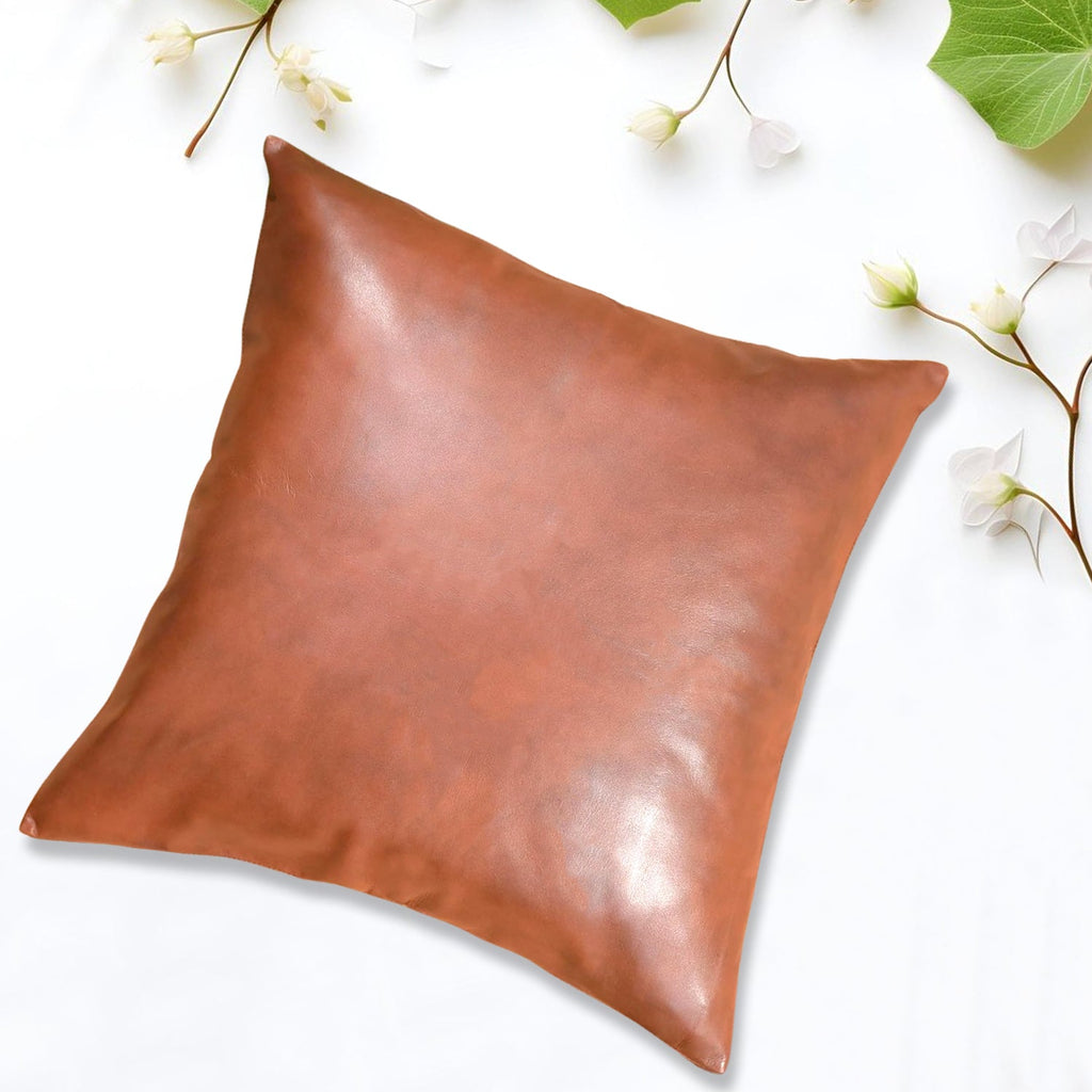 Stack of multiple  pillow covers (60x60 CM) in different colors, ready for shipping.