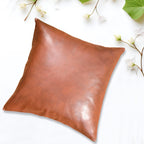 Stack of multiple  pillow covers (60x60 CM) in different colors, ready for shipping.
