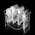 24-piece stainless steel cutlery set with elegant storage stand on table