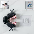 Antler style wall mounted mop and broom holder with adjustable grip