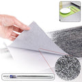 Roll of self-adhesive aluminium kitchen foil for surface protection.