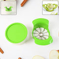 Apple cutter with container showing stainless steel blades slicing apple