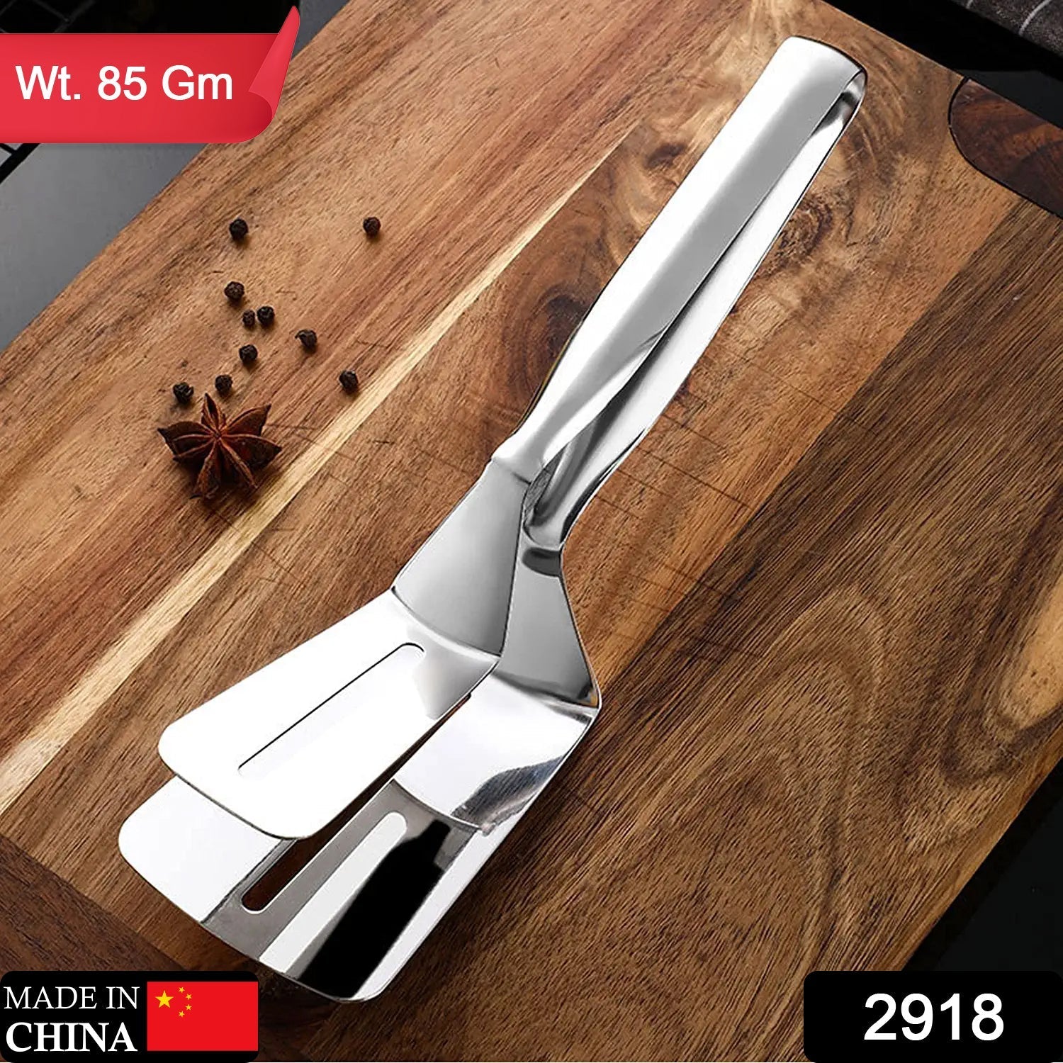 Quickslice stainless steel cooking tong flipping food in a pan.
