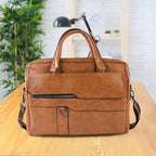 Tan brown faux leather laptop messenger bag with shoulder strap and handles