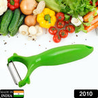 Green-handled Y-shape peeler for fruits and vegetables, shown on a clean white surface.