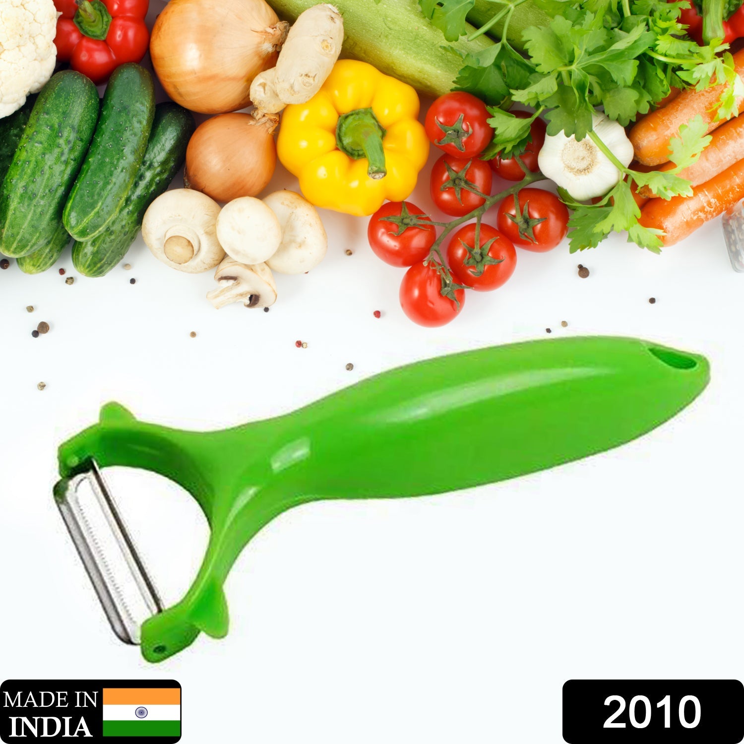 Green-handled Y-shape peeler for fruits and vegetables, shown on a clean white surface.